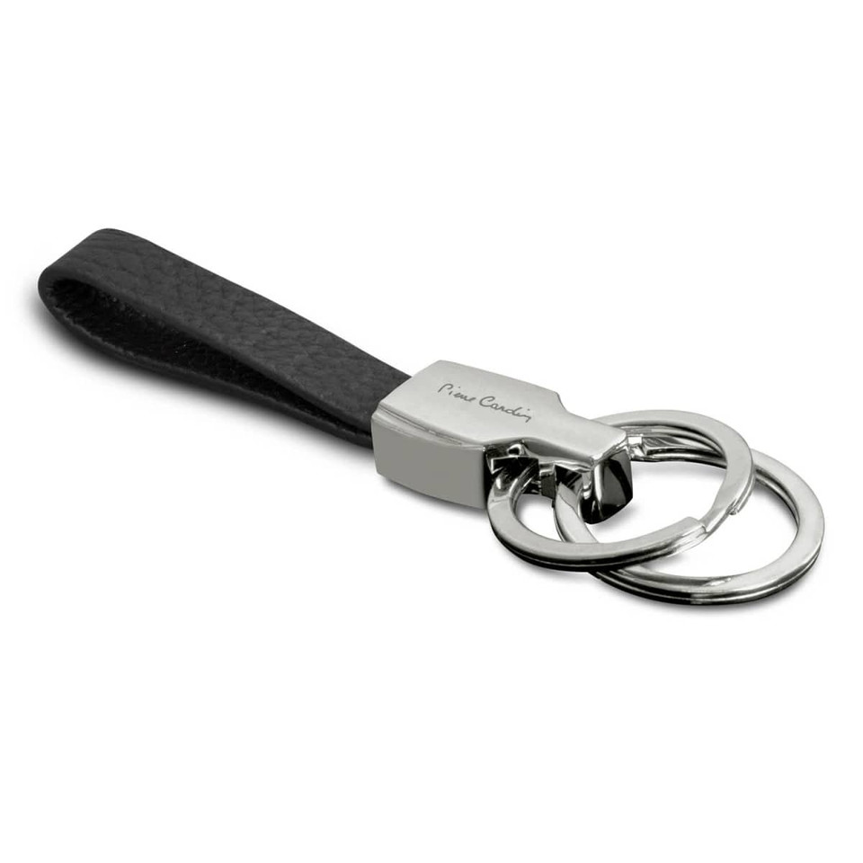 A black leather key ring featuring a silver metal clasp and two key rings, with a logo on the metal.
