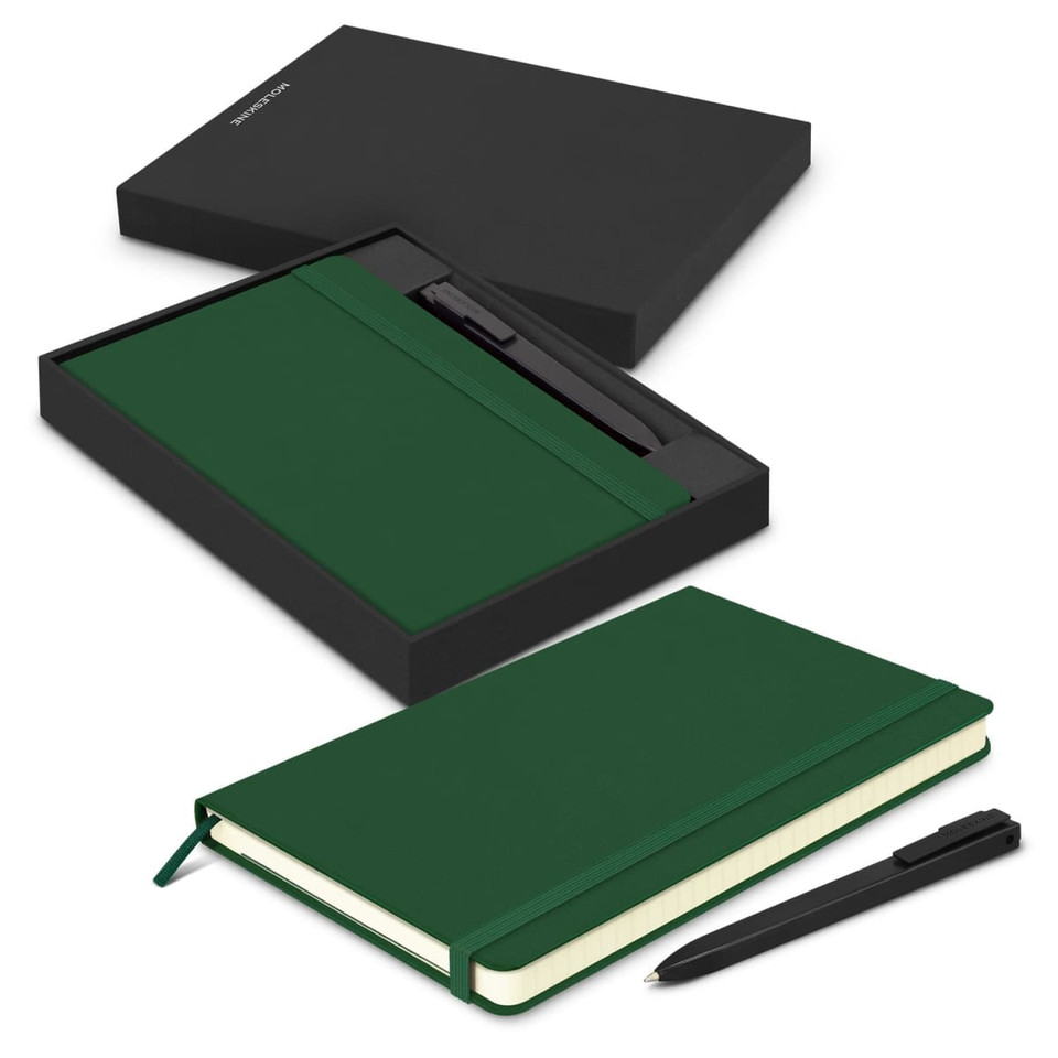 A green Moleskine notebook and black pen displayed within a black gift box. The set includes an elastic band and ribbon bookmark.
