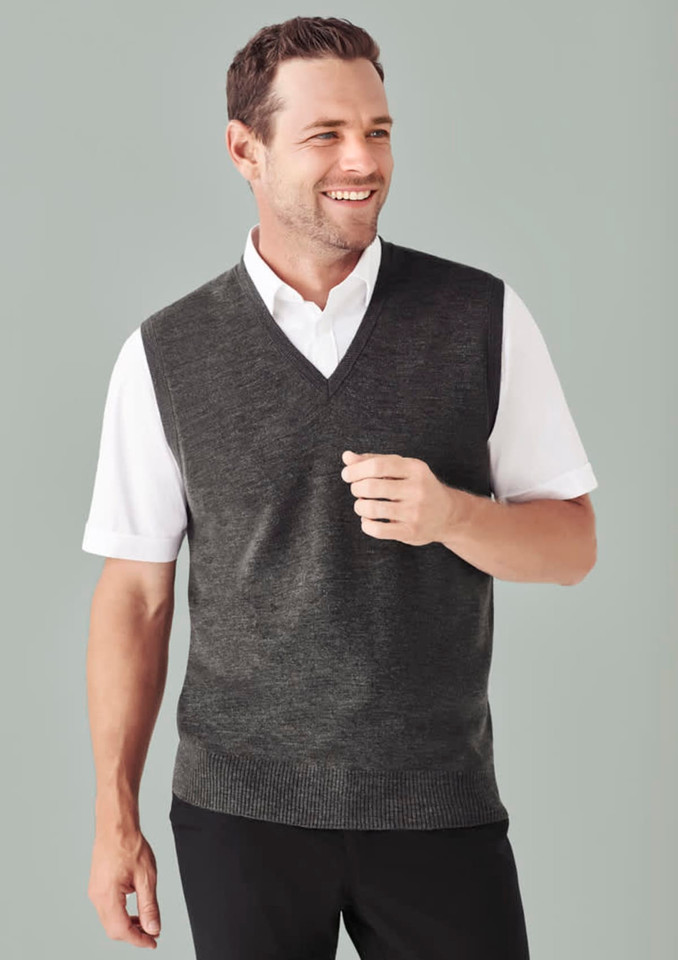 A dark grey men's vest with a V-neck design, worn over a white short-sleeved shirt. Features a branding logo.