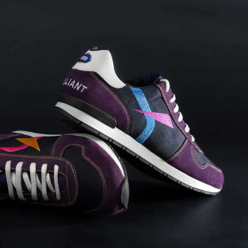 Custom ASB Branded merchandise sneakers in corporate colours and logo elements embroidered to the side of the sneakers.