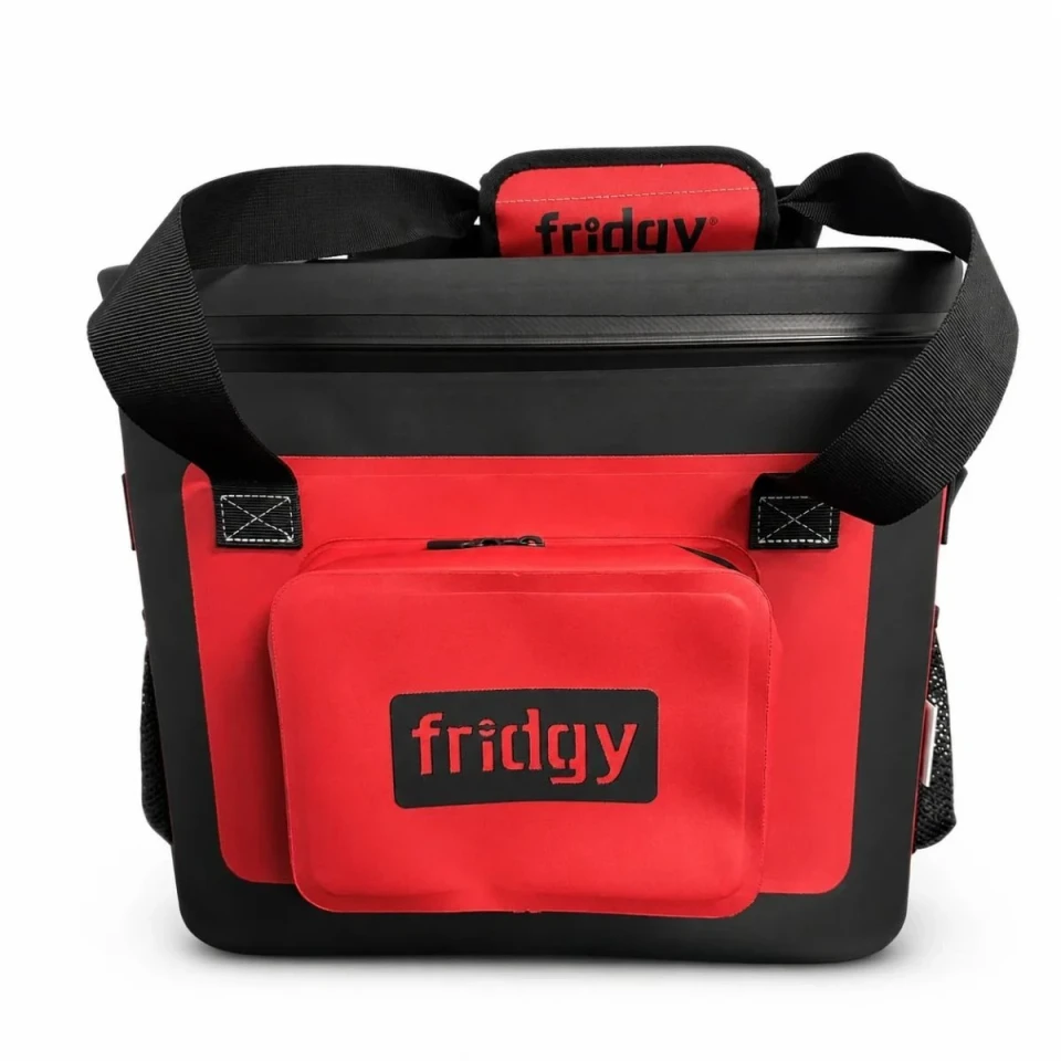 Front view of a black and red Fridgy 20L cooler bag showcasing a waterproof accessory pocket, reinforced carry handles, and a heavy-duty insulated design for outdoor adventures.