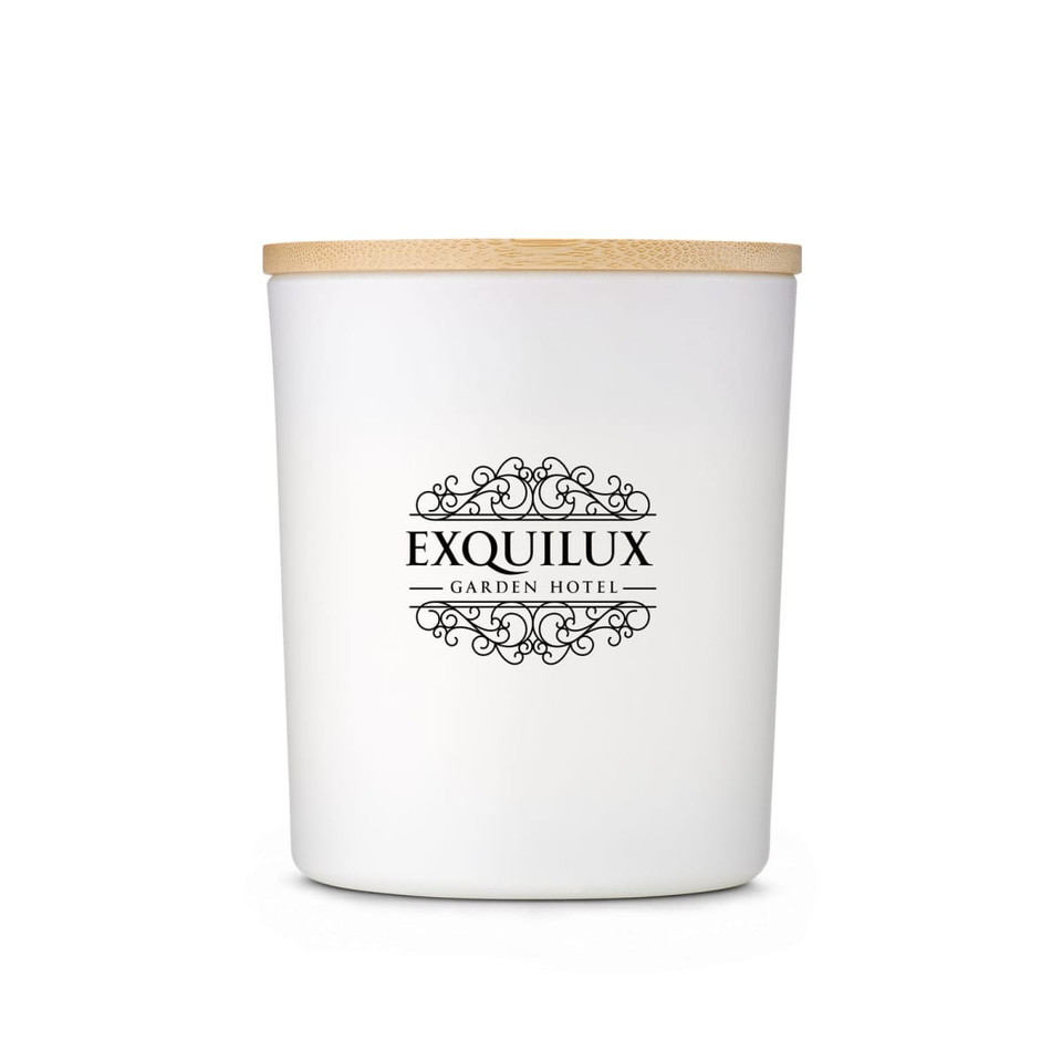 A white candle jar with a bamboo lid, featuring a decorative logo on the front.