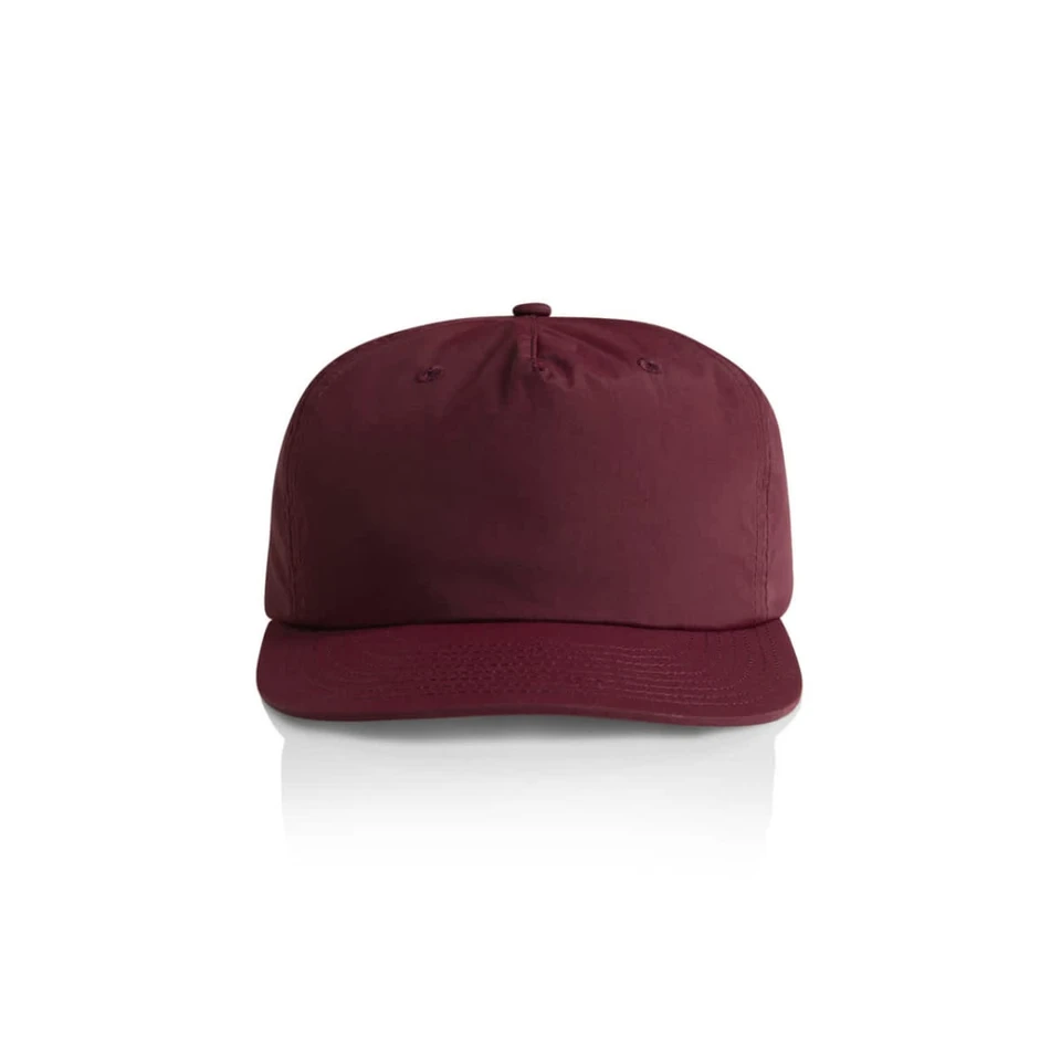 A maroon cap featuring a curved peak, with a logo on the front, presented against a plain background.