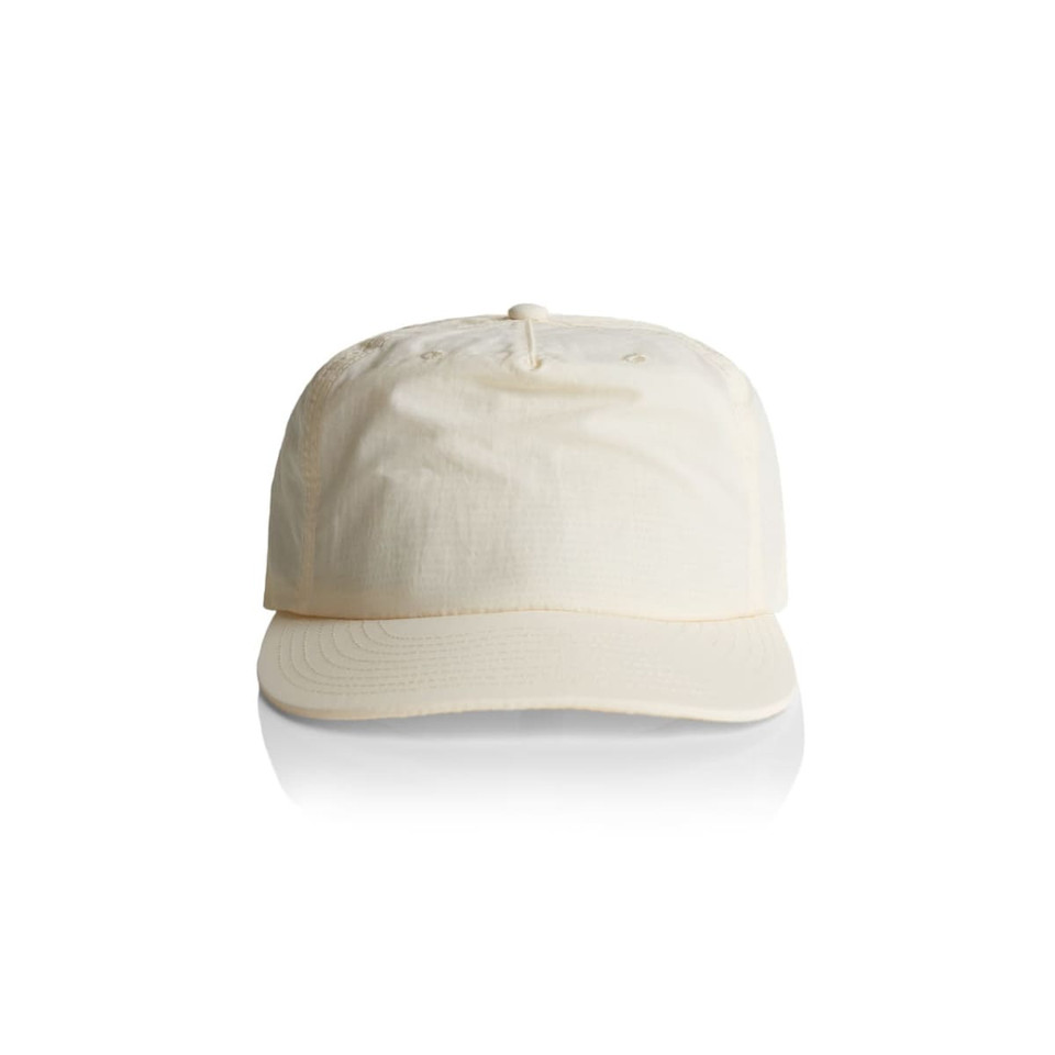 A cream-coloured cap with a curved visor and a logo on the front. The material appears lightweight and structured.