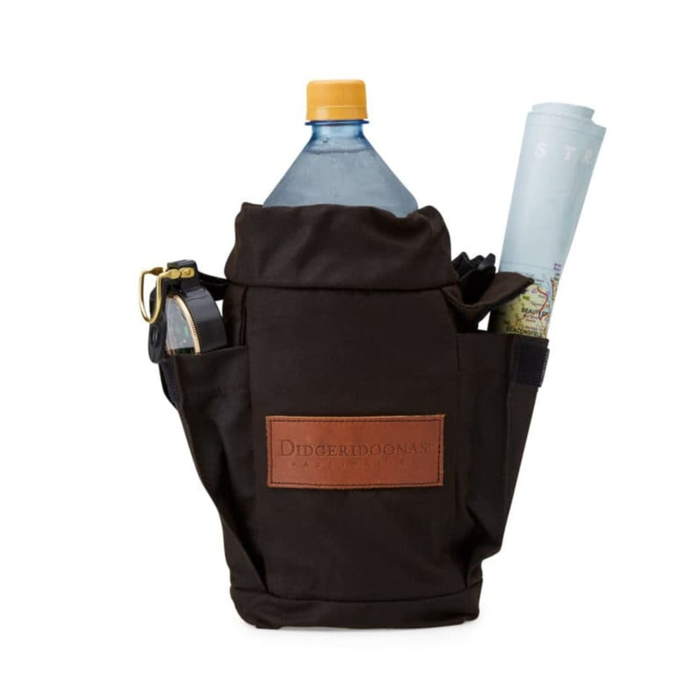 A black carrier with compartments holding a drink bottle, a map, and small tools. The carrier features a logo.