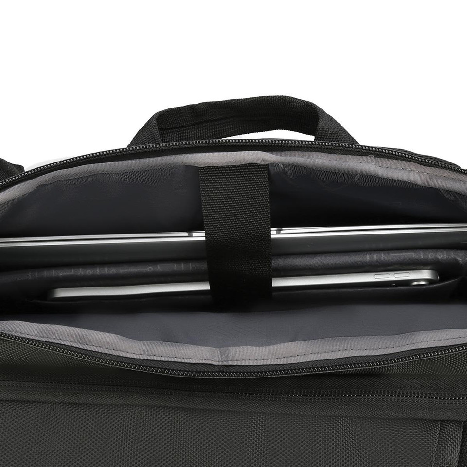 A black backpack interior featuring a sleek laptop compartment and grey lining. It includes a brand logo.