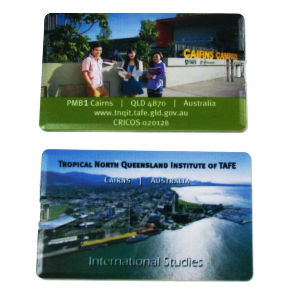 A flat USB drive featuring images of Cairns and the Tropical North Queensland Institute of TAFE, with various colours.