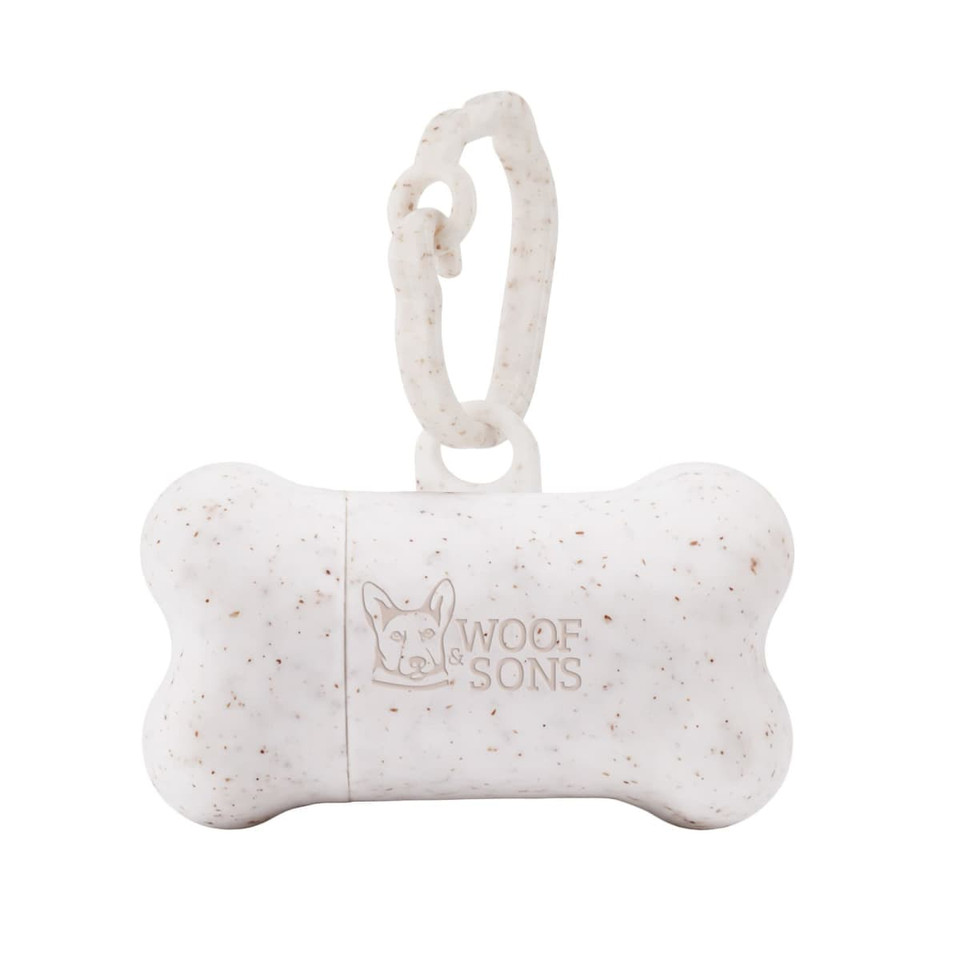 A white bone-shaped dog waste bag dispenser with a clip for attachment, featuring a logo.