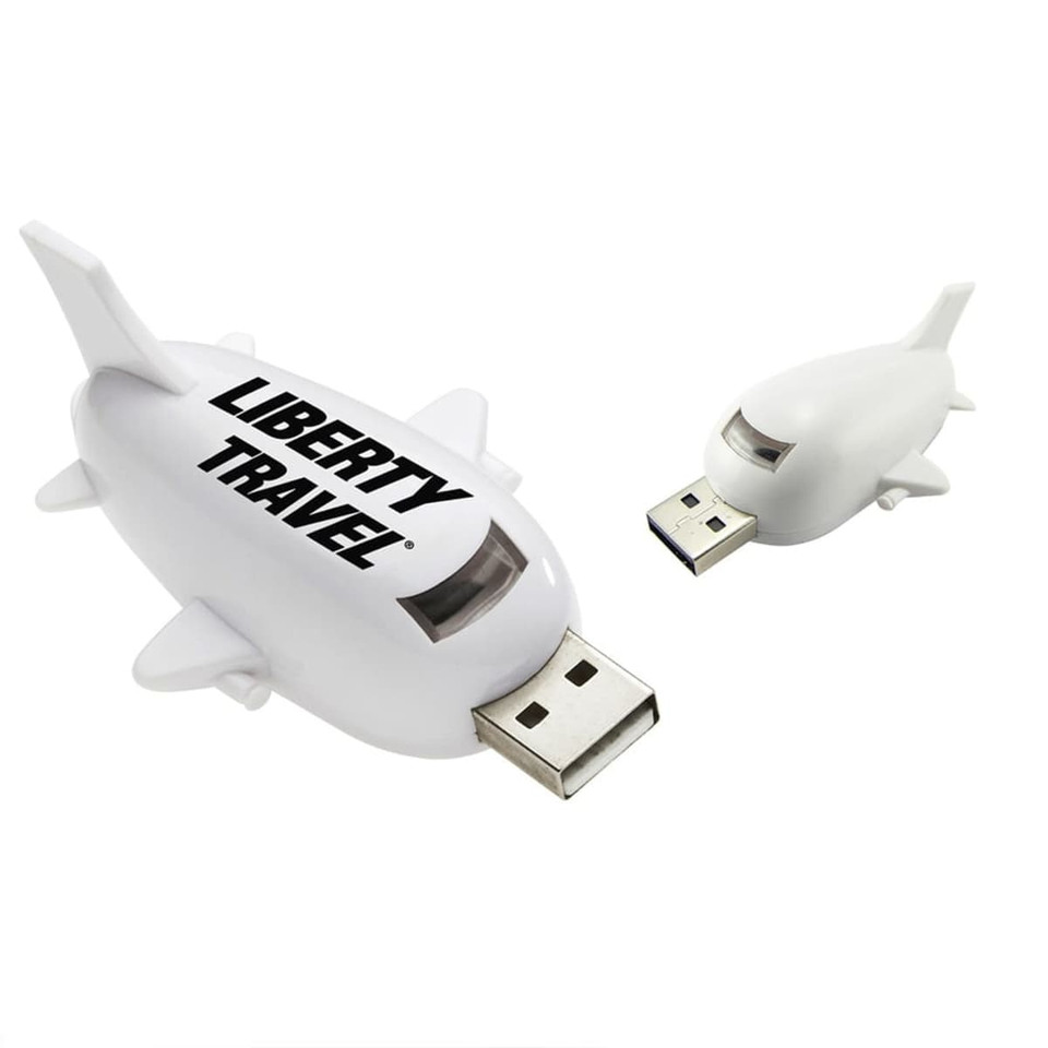 A white aircraft-shaped flash drive with a small matching design, featuring a logo on its side.