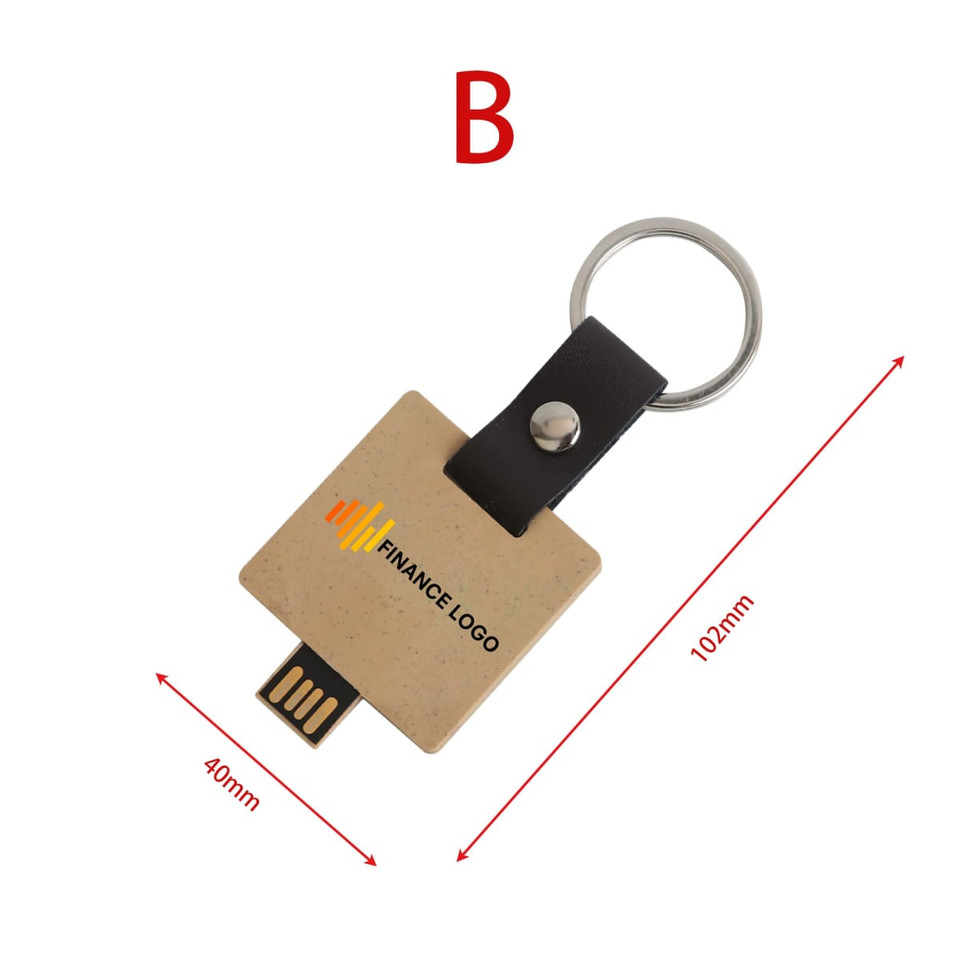An eco-friendly mini flash drive keychain in a beige and black design with a circular metal keyring.