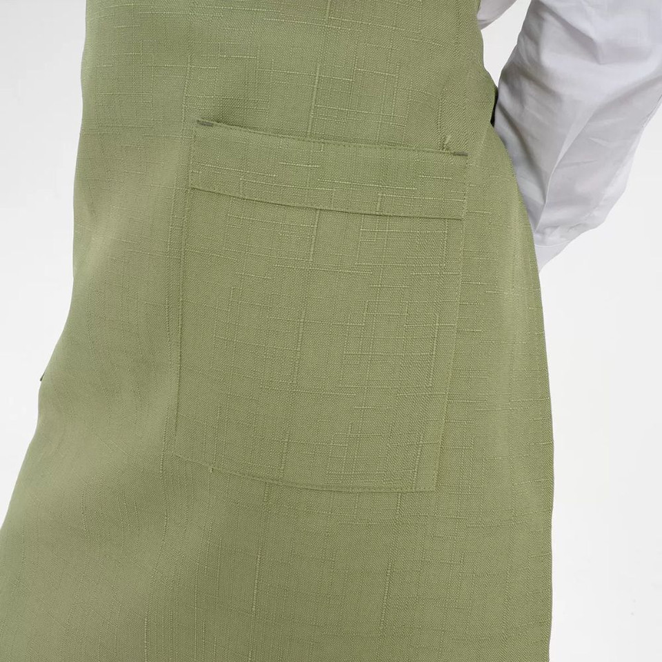 A green apron with a simple design featuring two front pockets and a neck strap. It has a small logo.