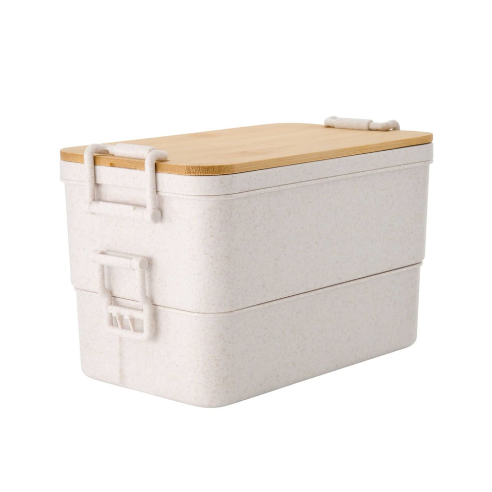 A dual-compartment lunch box in white with a bamboo lid, featuring a secure latch and branding.