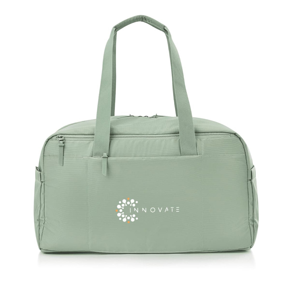 A light green duffle bag with a logo, featuring two handles and zippered compartments.