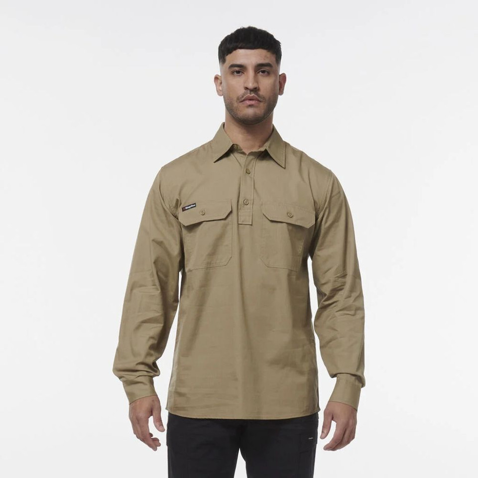 Man wearing a khaki long-sleeve button-up shirt modeled in studio.