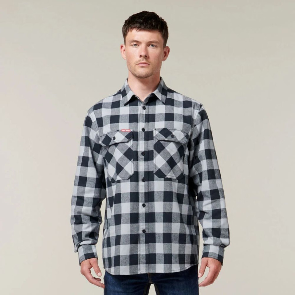 Man wearing white checkered flannel shirt.