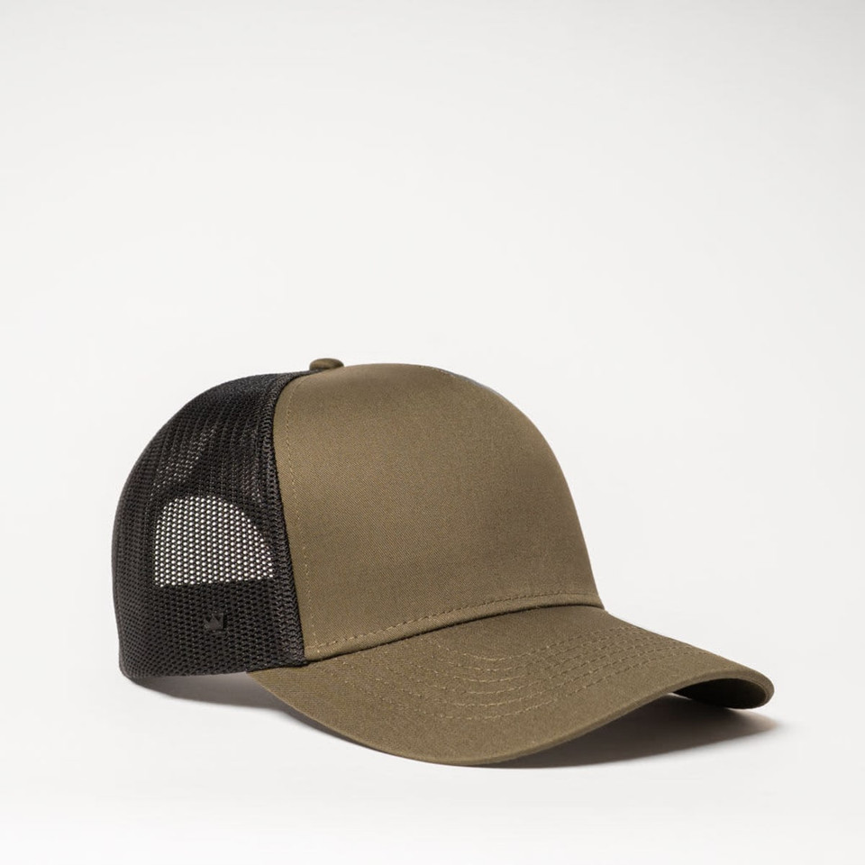 An olive green trucker cap with a black mesh back and a curved peak, featuring a logo on the side.