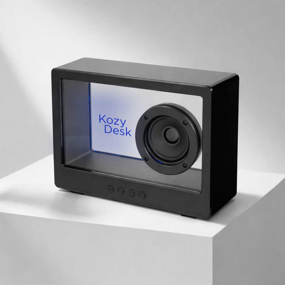 A black speaker with a transparent front, featuring a visible speaker cone and a logo inside.