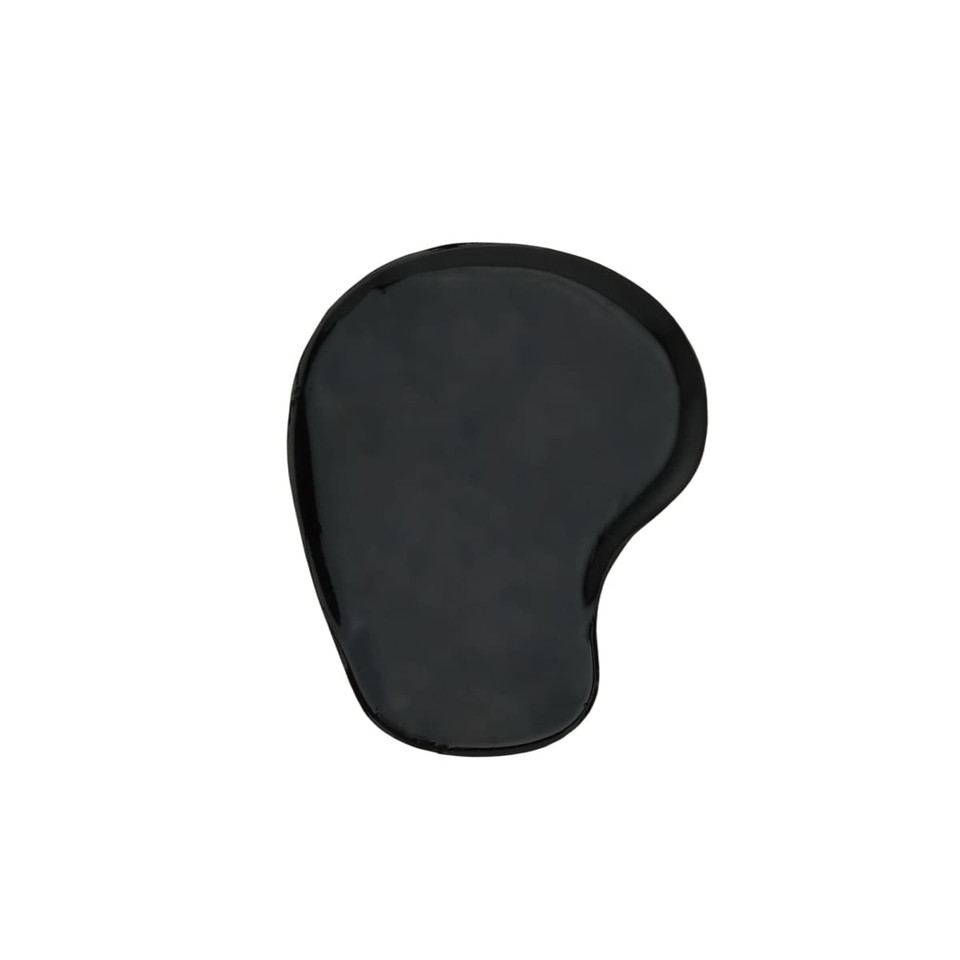 A lightweight black gel pad with a smooth surface and an irregular shape, featuring a logo.