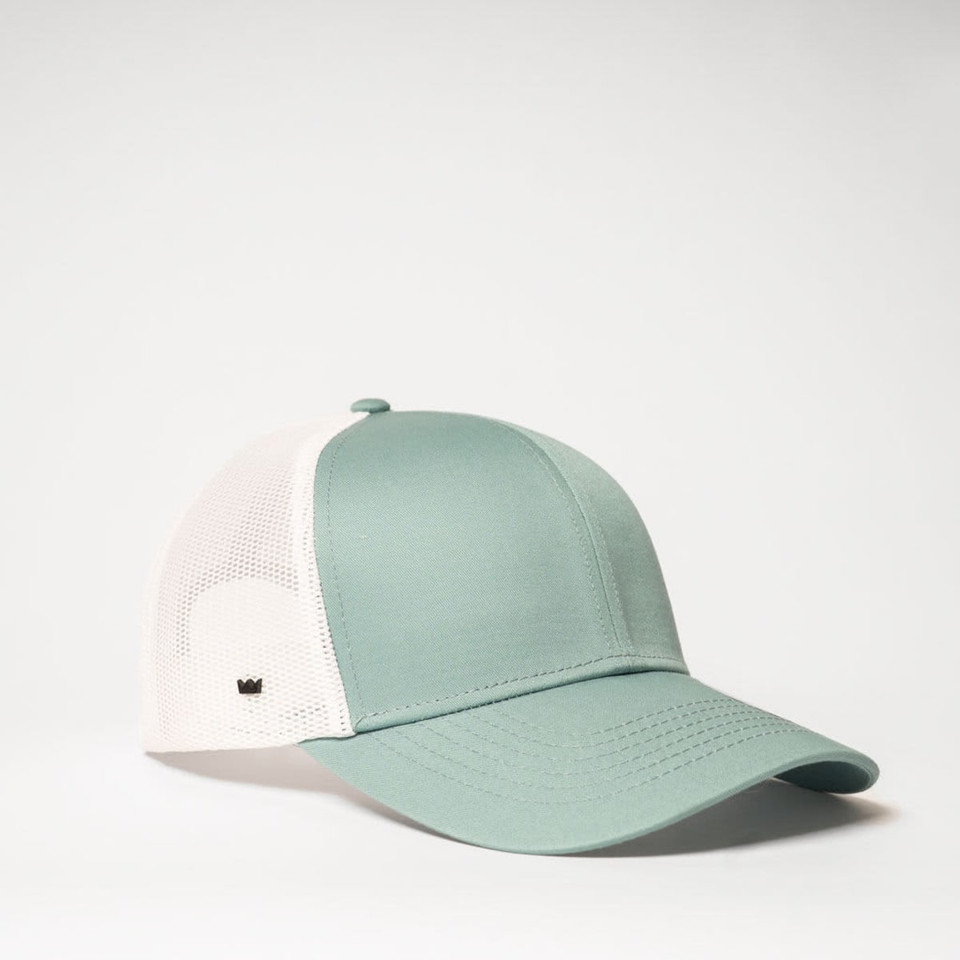 A green and white six-panel trucker cap featuring a mesh back and a logo on the side.