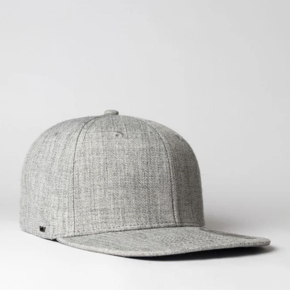 Gray wool baseball cap on white background.