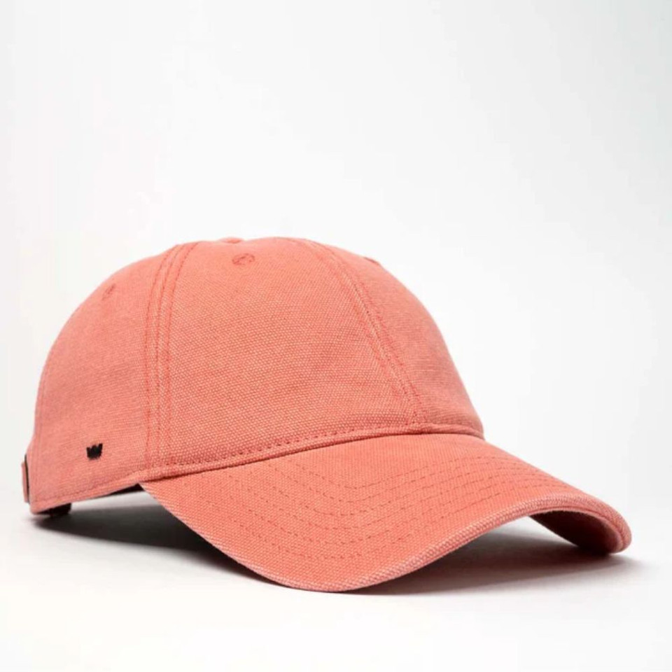 A coral pink cotton canvas unstructured six-panel cap with a logo.