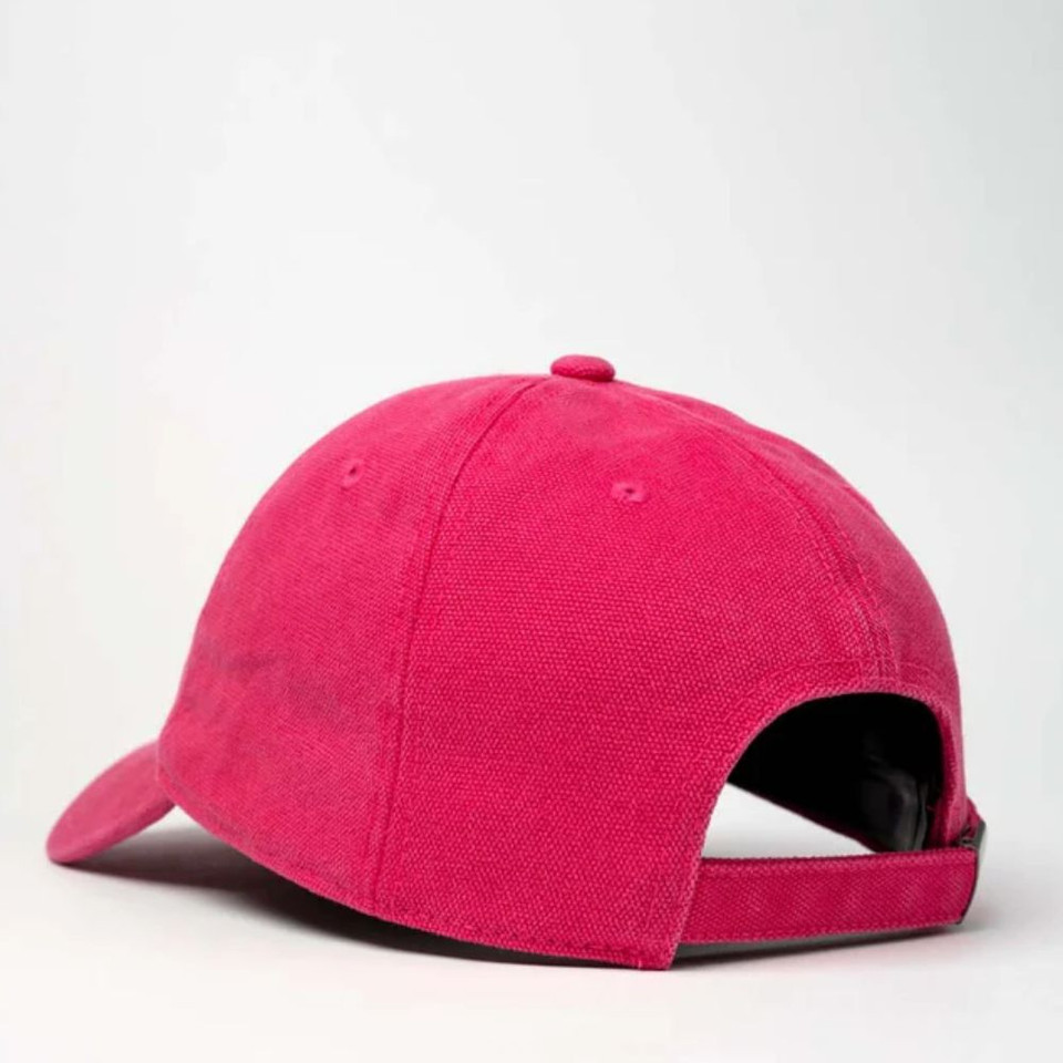 Bright pink baseball cap with adjustable strap on white background.