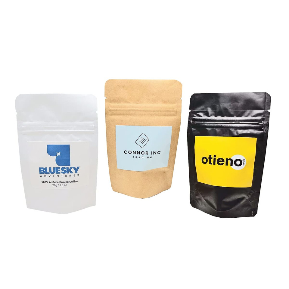 Three small stand-up pouches for espresso coffee in white, kraft brown, and black, each featuring a logo.