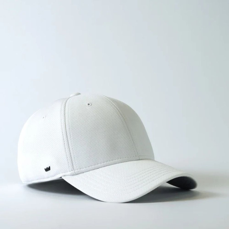 White baseball cap on a plain background.