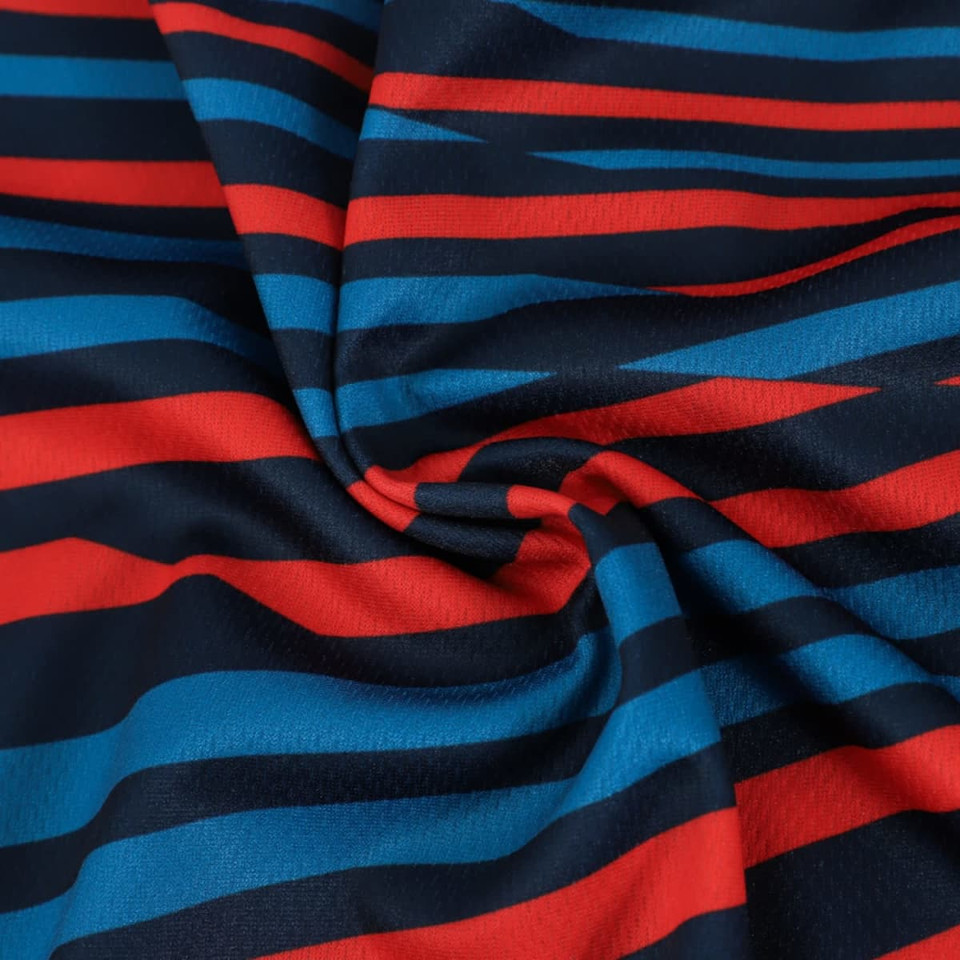 A fabric featuring a pattern of horizontal stripes in blue, red, and navy, made from 100% polyester.