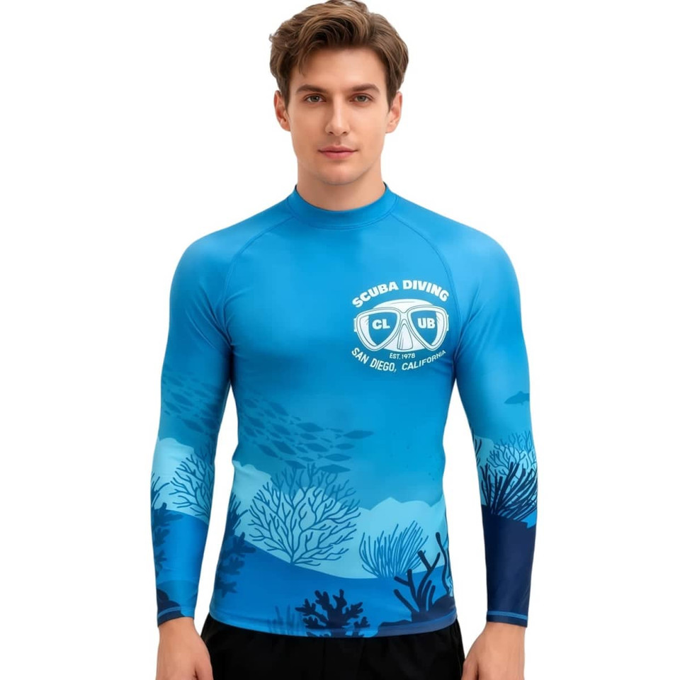 A blue long-sleeve rashie featuring an underwater design and a logo, designed for sun protection.