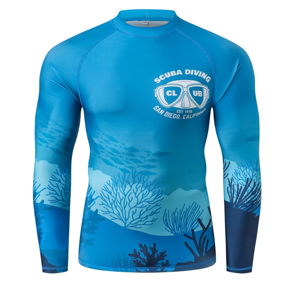 A long-sleeved rashie in various shades of blue, featuring a scuba diving design and a logo on the front.