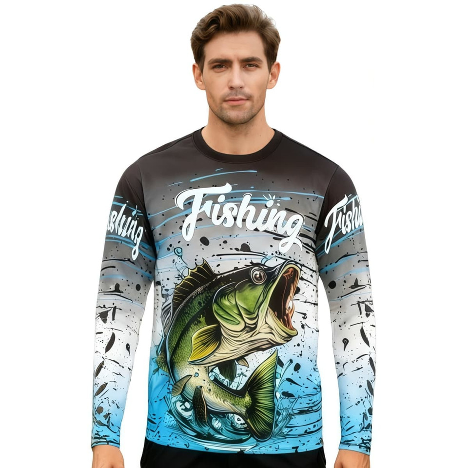 A man wearing a long-sleeved fishing shirt in blue, black, and white featuring a vibrant fish graphic and branding.
