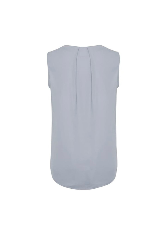 A pale blue sleeveless blouse with pleat detail at the back and a rounded hemline. It has a branding logo.