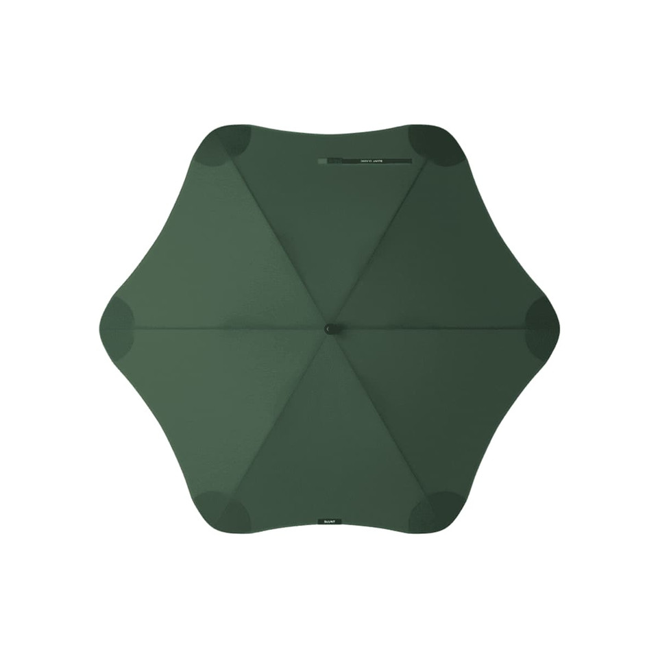 A green BLUNT Classic Umbrella with an eight-panel design and a central hub. The umbrella features a logo.