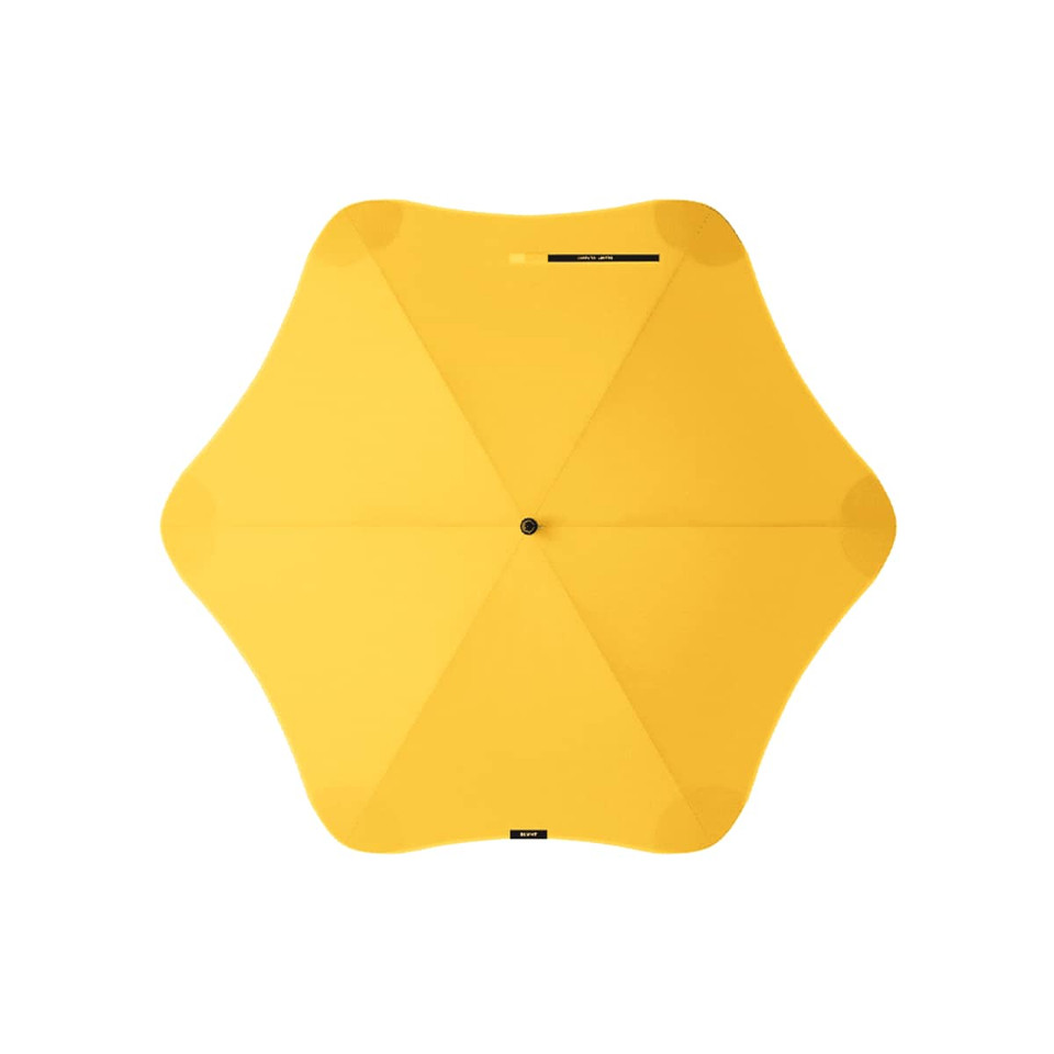 A yellow umbrella with a star-shaped canopy and a central pole. It has a logo on its surface.
