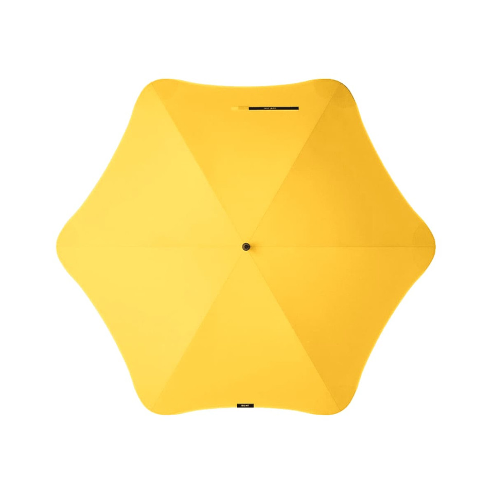 A yellow umbrella with a unique star shape, featuring a central button and a logo.