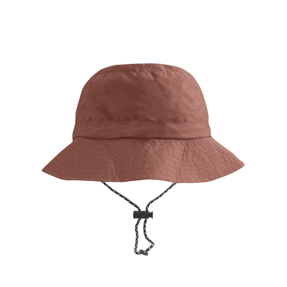 A foldable bucket hat in a rust colour, featuring a brim and an adjustable chin strap. It has a logo.