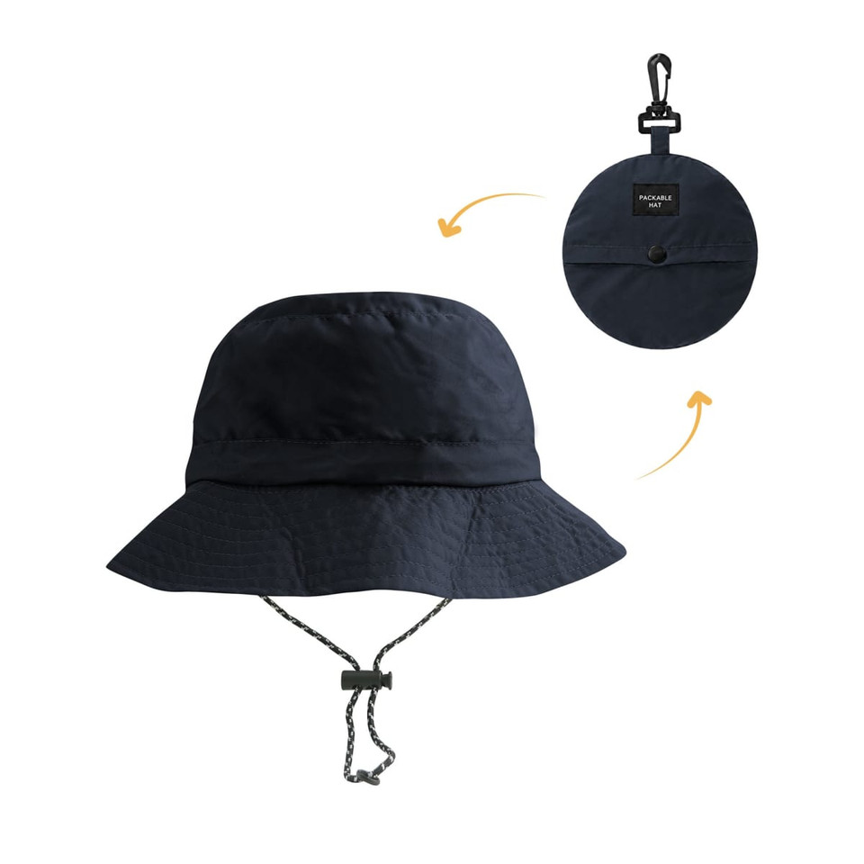 A foldable bucket hat in navy blue with a branding logo and a convenient clip for attachment.