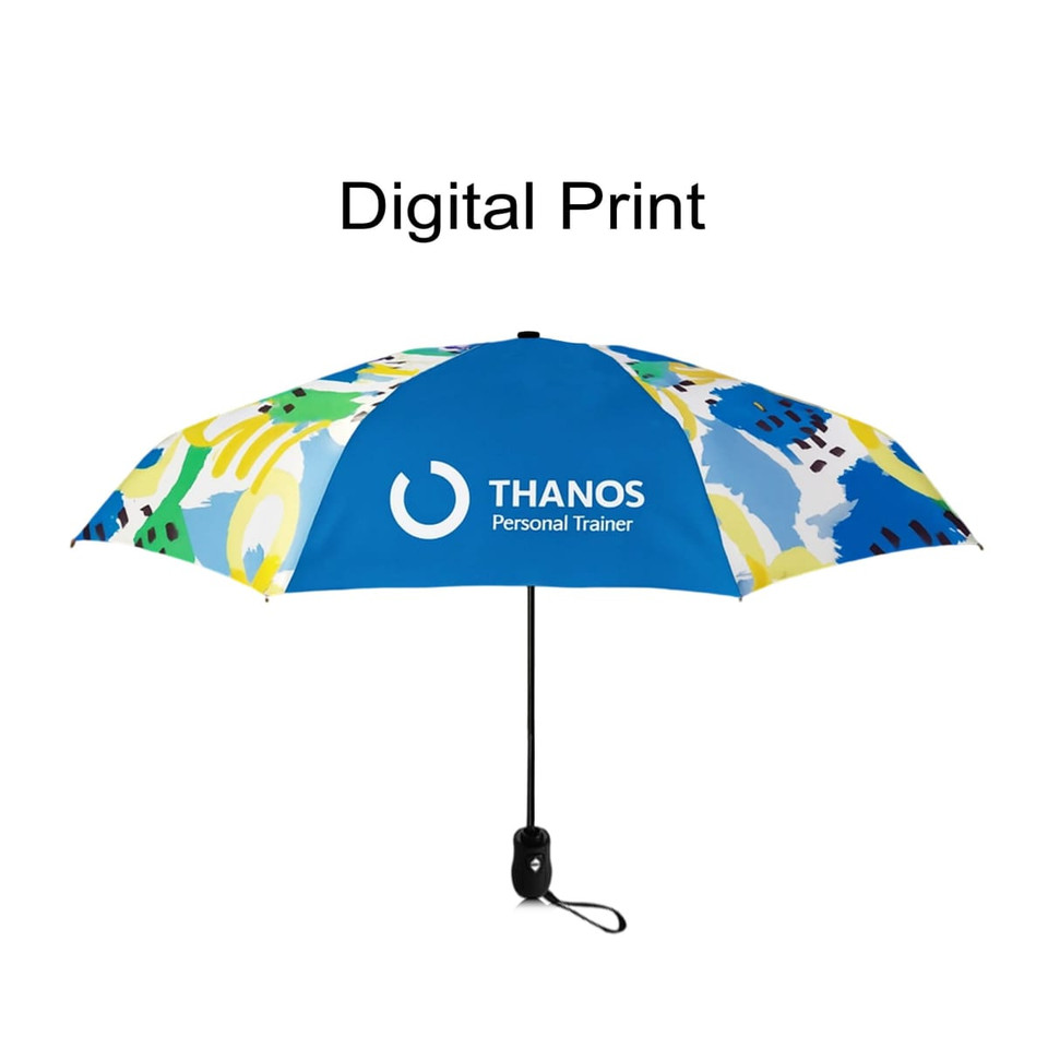 A light mini auto umbrella with a blue, yellow, and green abstract design and a logo on one panel.