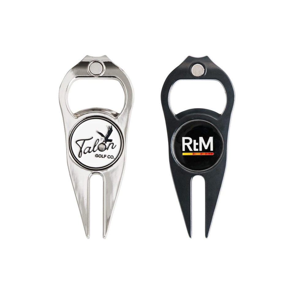 A golf divot tool with a ball marker and bottle opener, featuring silver and black designs and logos.