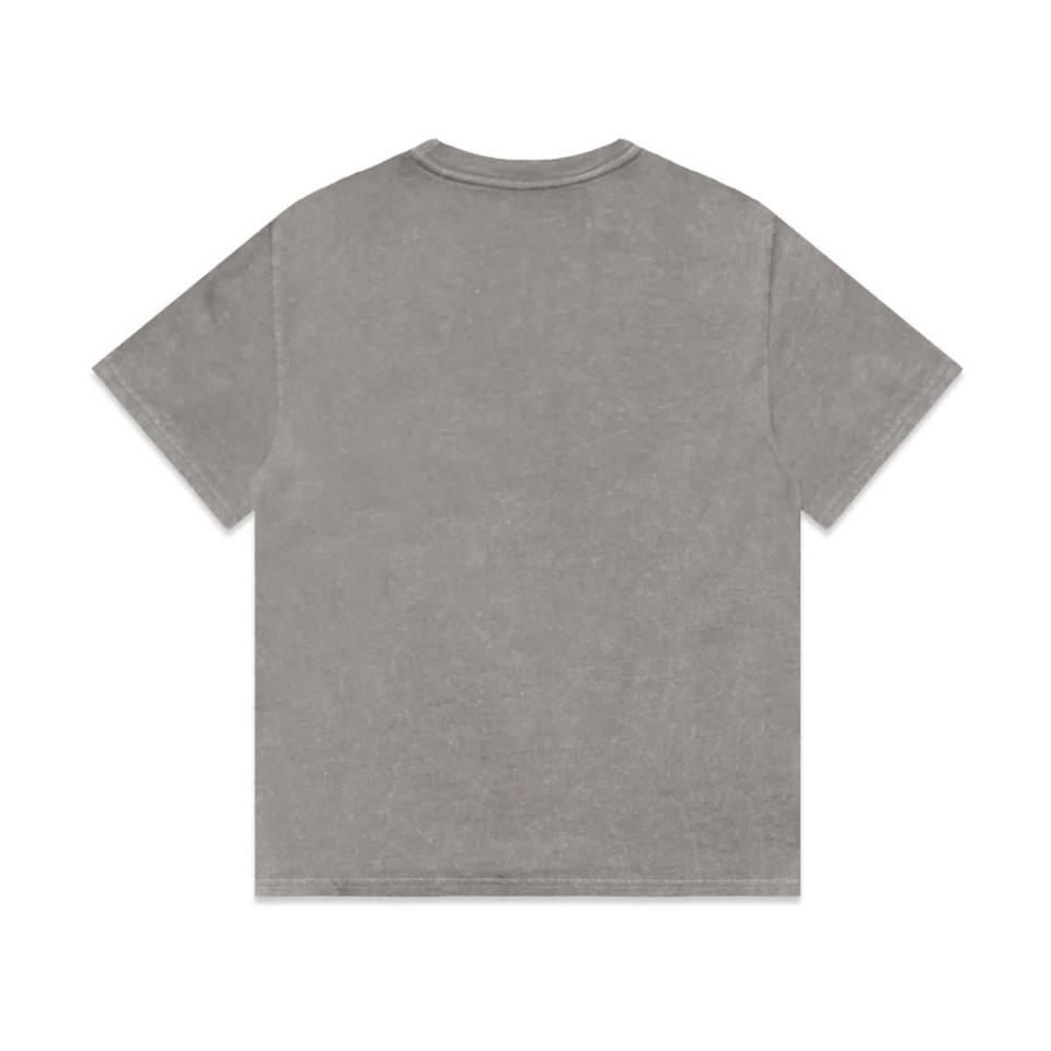 A grey stone wash heavy tee with short sleeves and a round neckline. The shirt features a logo on the back.