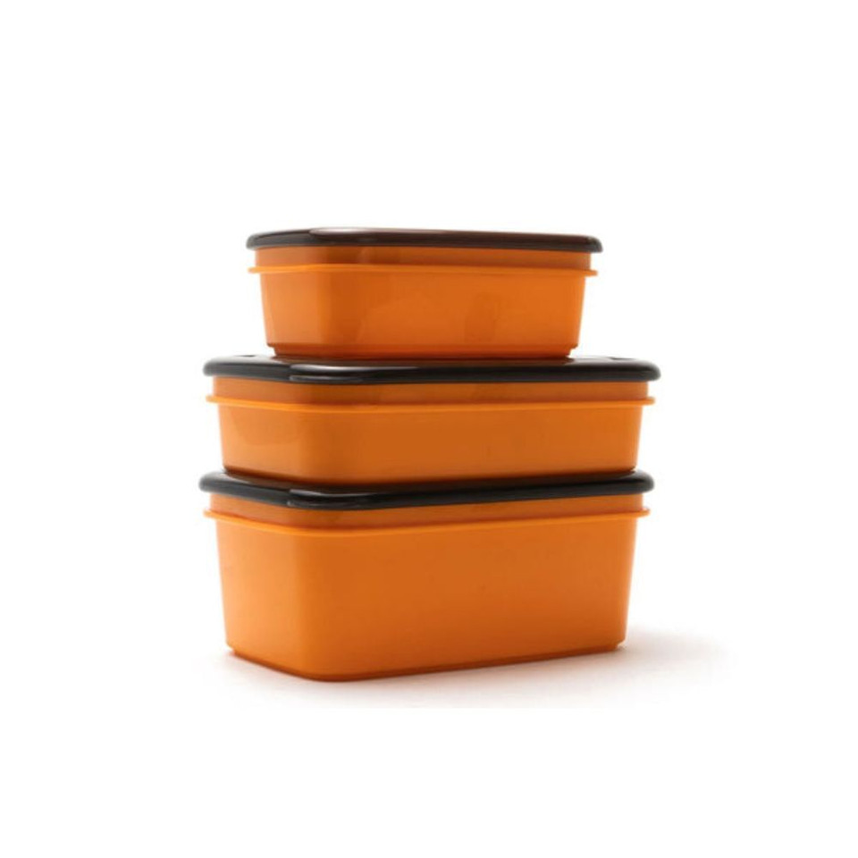 Stacked orange food storage containers with black lids.