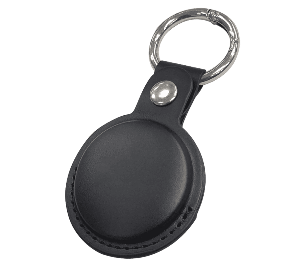 A black tracking tag with a leather-like case and metal keyring attachment.