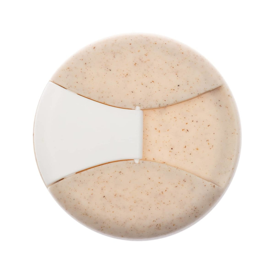 A reusable coffee cup in a beige color featuring a silicone band and a sleek design. It also has a logo.