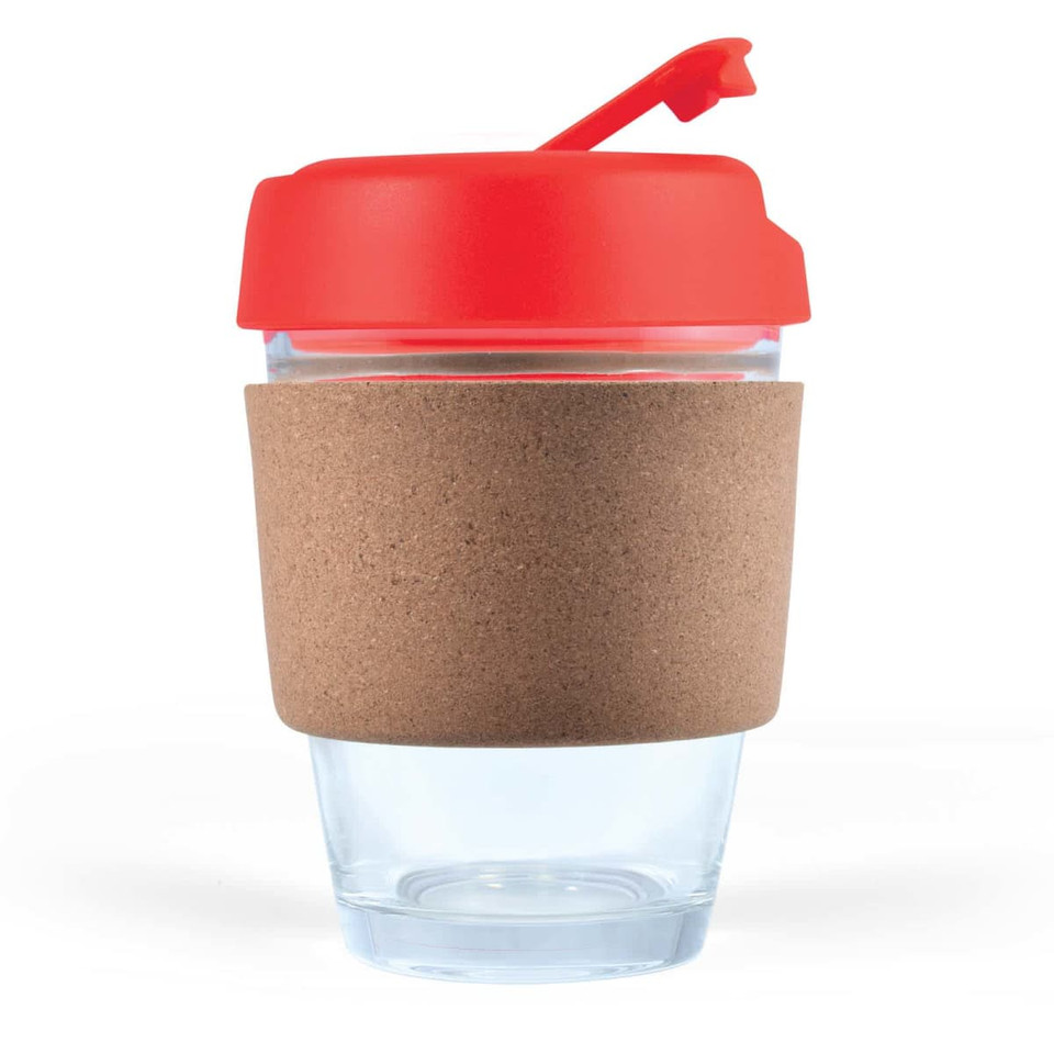 A reusable coffee cup featuring a clear body, a cork band for grip, and a red lid with a flip-top opening.