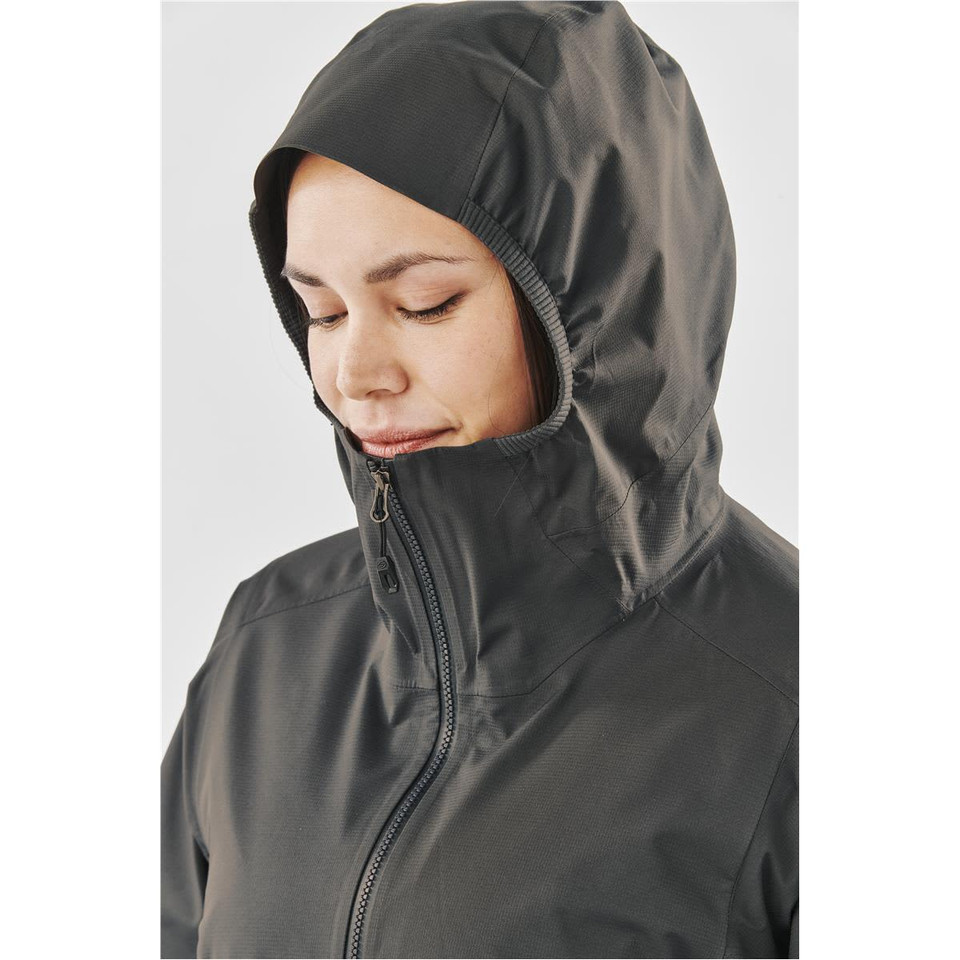A close-up of a women's rain jacket in dark grey, featuring a hood and a zipped front. The jacket has a logo.