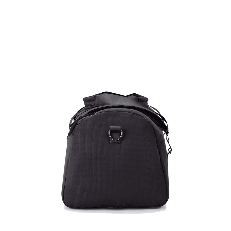 A black duffel bag with a wide opening, featuring a handle and shoulder strap attachments, and a loop on the front.