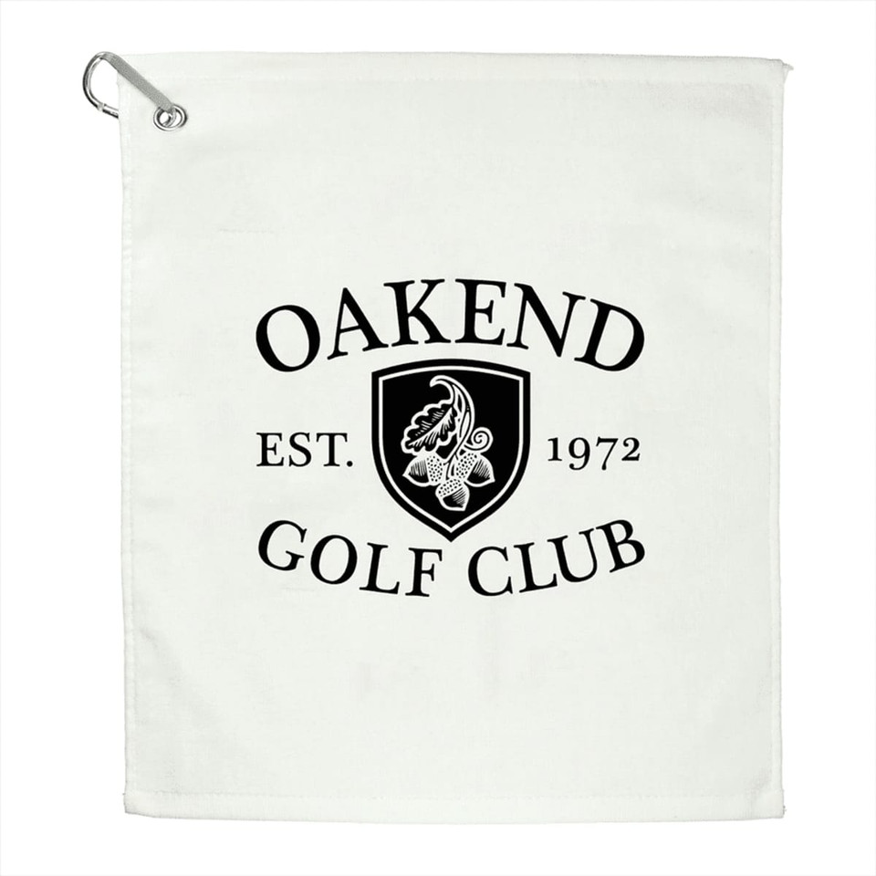 A white terry golf towel featuring a black logo with the text "Oakend Golf Club" and an established date of 1972.