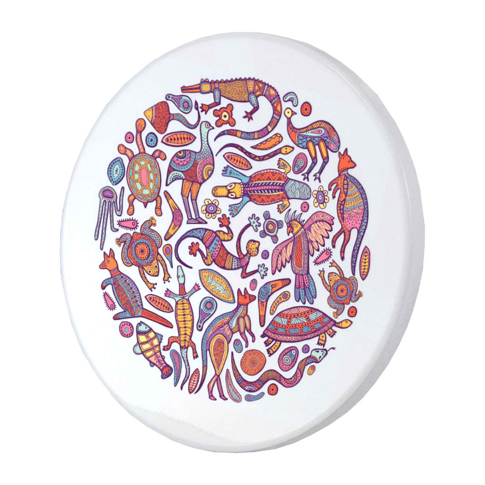 A circular ceramic coaster featuring vibrant, multicoloured Aboriginal-inspired designs of various animals.