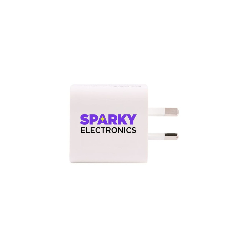 A white charging adapter with two prongs and a logo on the front.